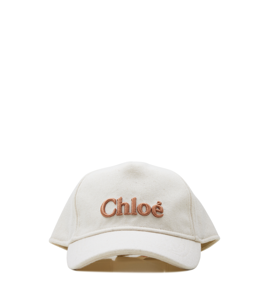 Beige cap with 'Chloe' embroidery on a white background