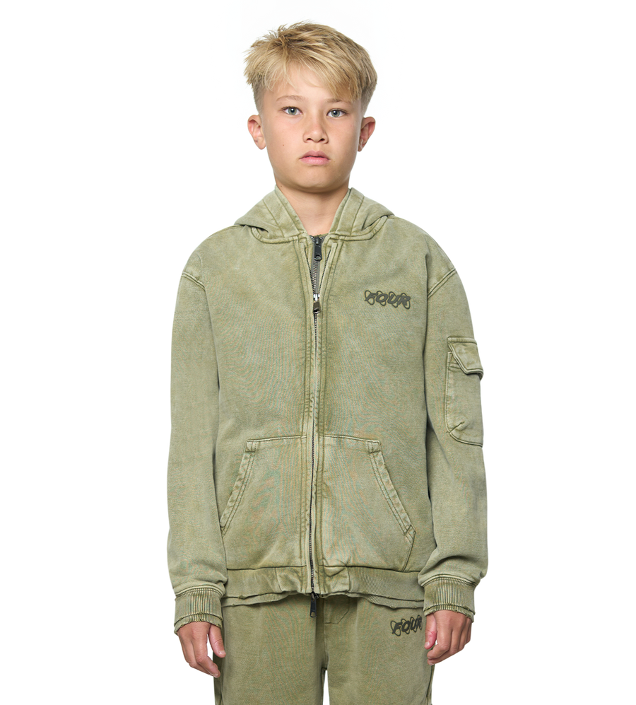 Child wearing a green hoodie and pants with a brand logo on a white background