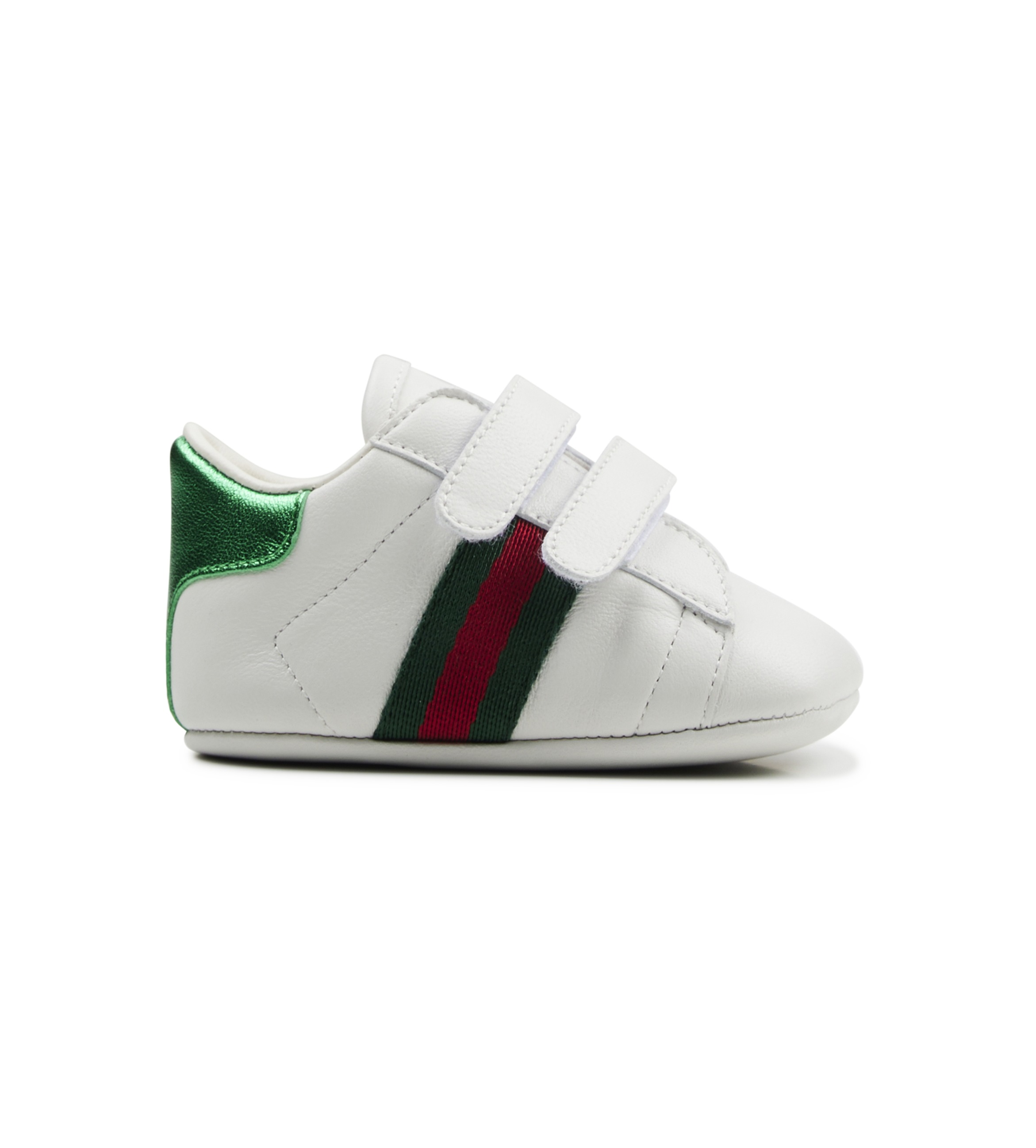 white baby shoe with green and red stripes
