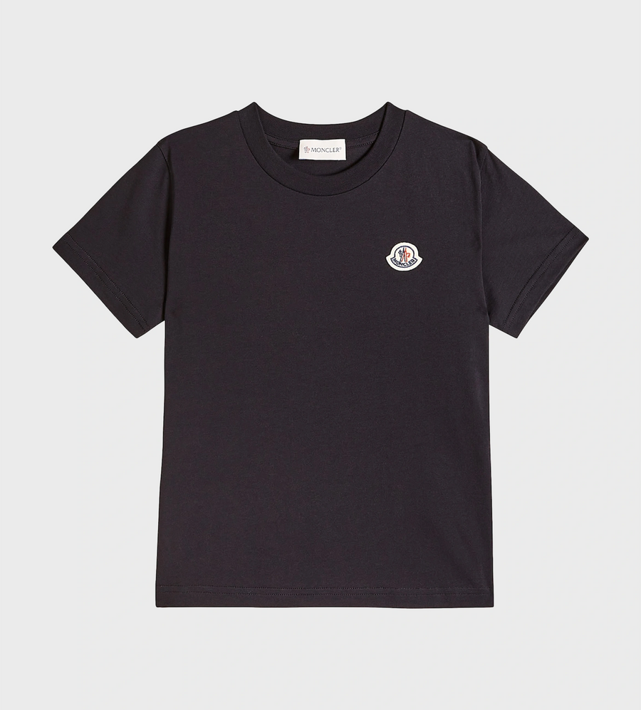 A black T-shirt with a logo-patch on the front and a crew neck.