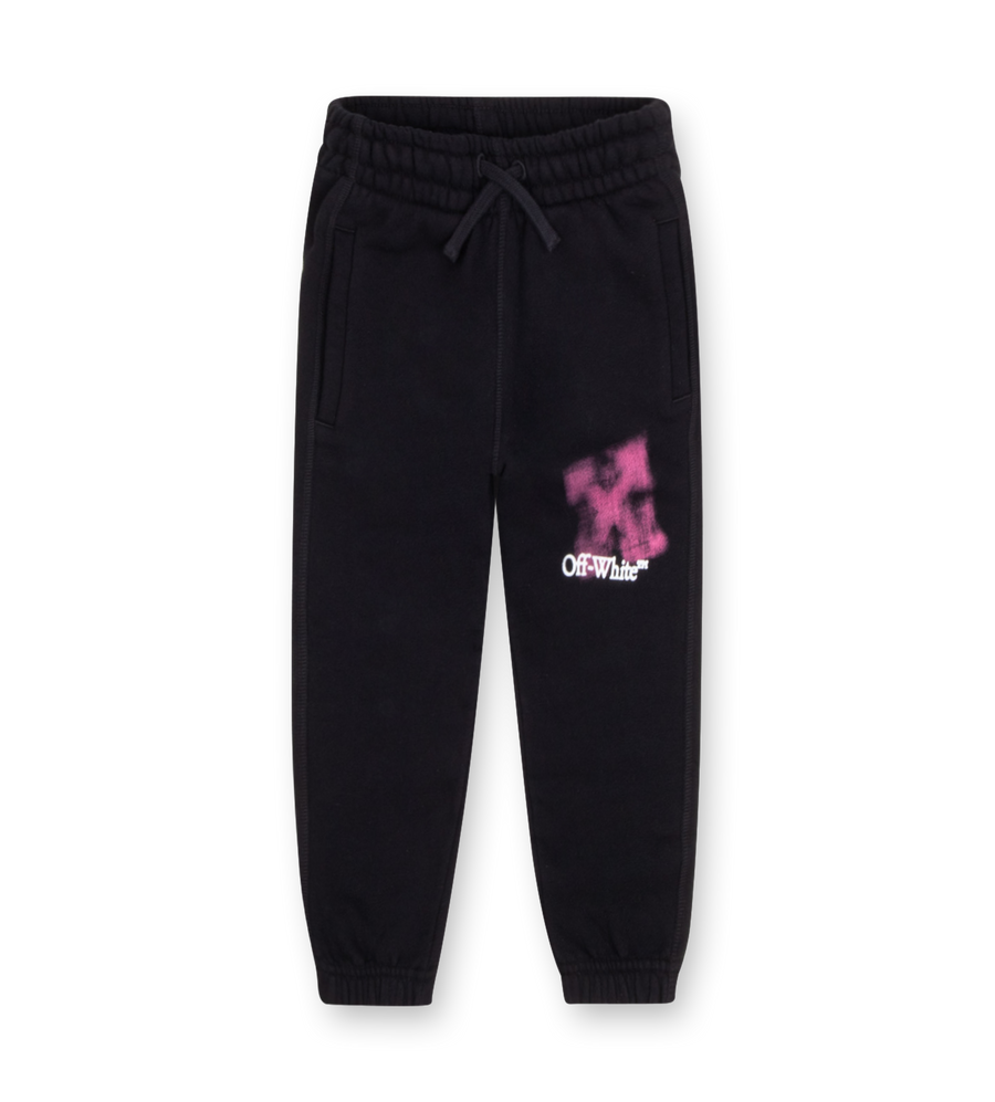 Off-White Arrow Spray Sweatpants in black with fuchsia spray print and arrow motif at back.