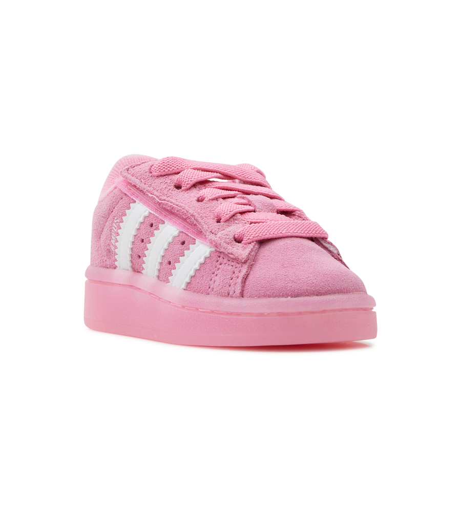 Pink Adidas sneaker with white stripes on a white background
