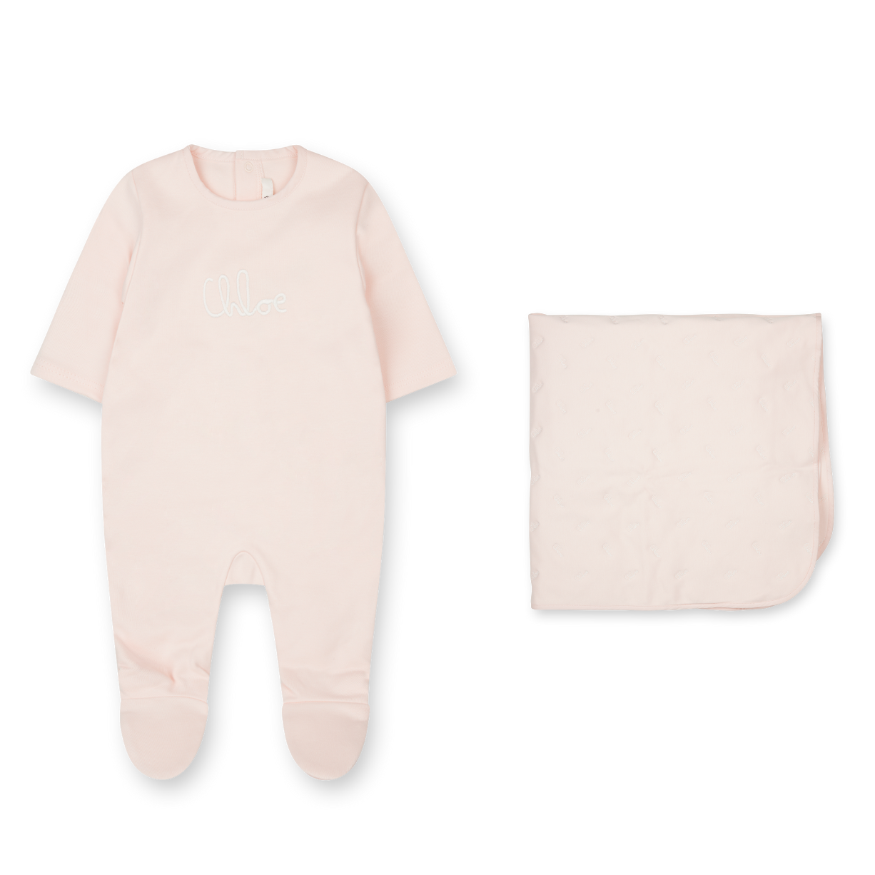 Baby onesie with footies and matching bag on a white background
