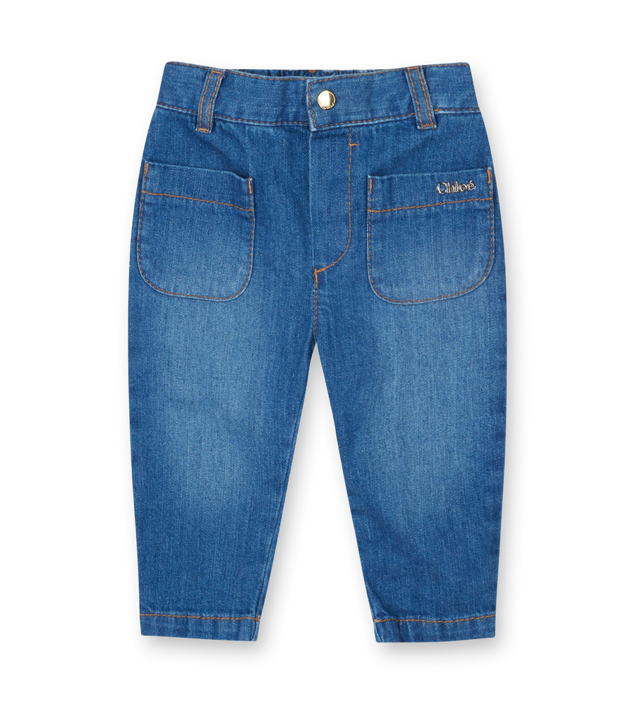 Blue denim jeans on a white background