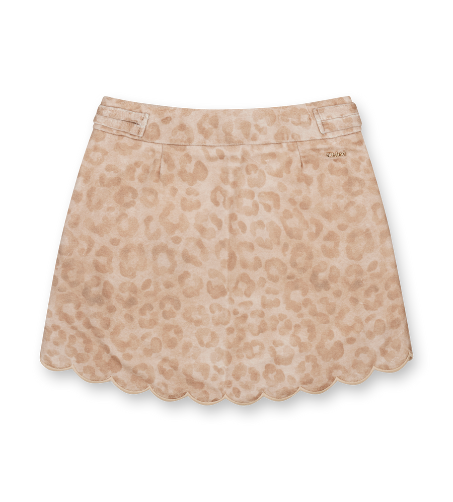 Beige skirt with leopard print pattern on a white background