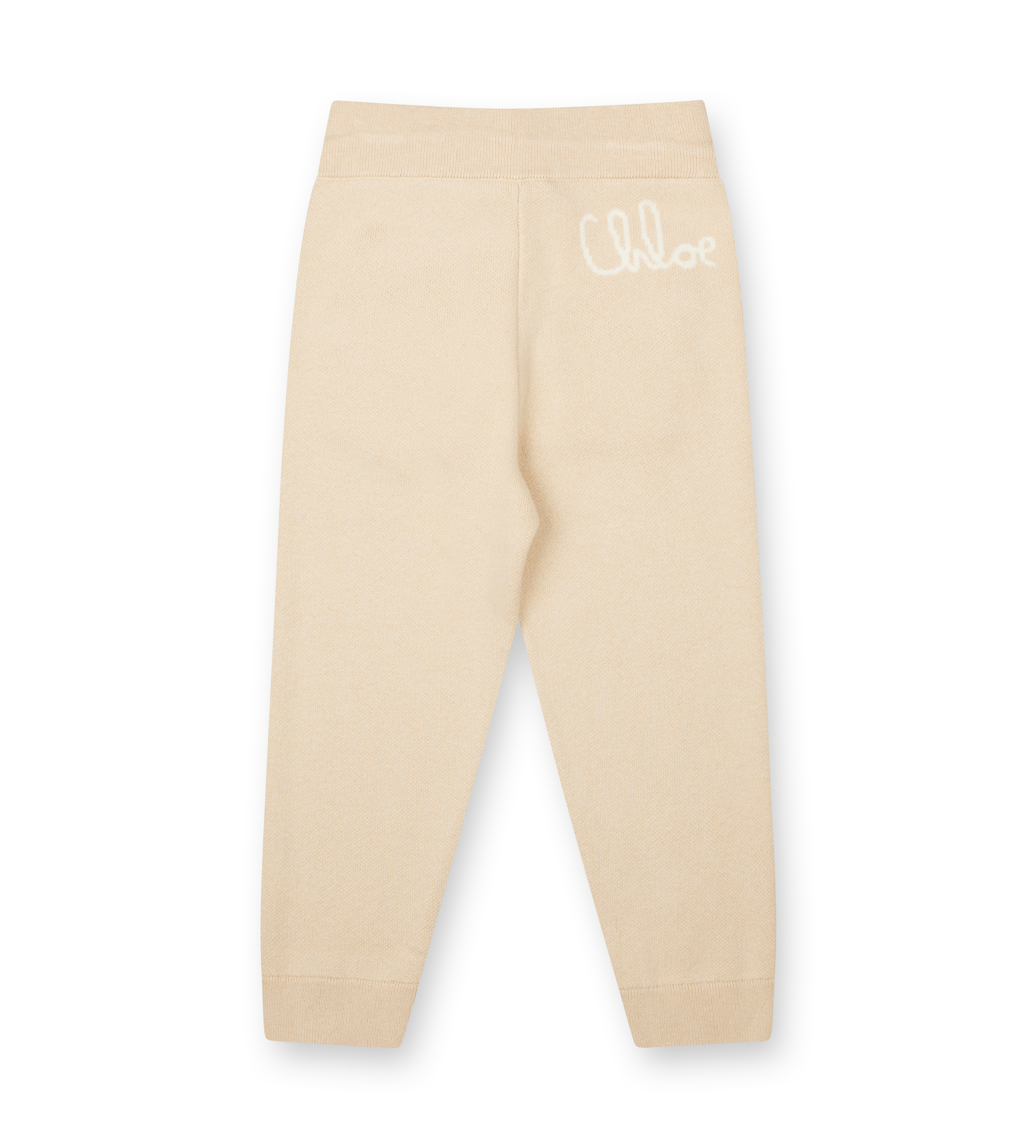 Beige leggings with 'Chloe' branding on a white background