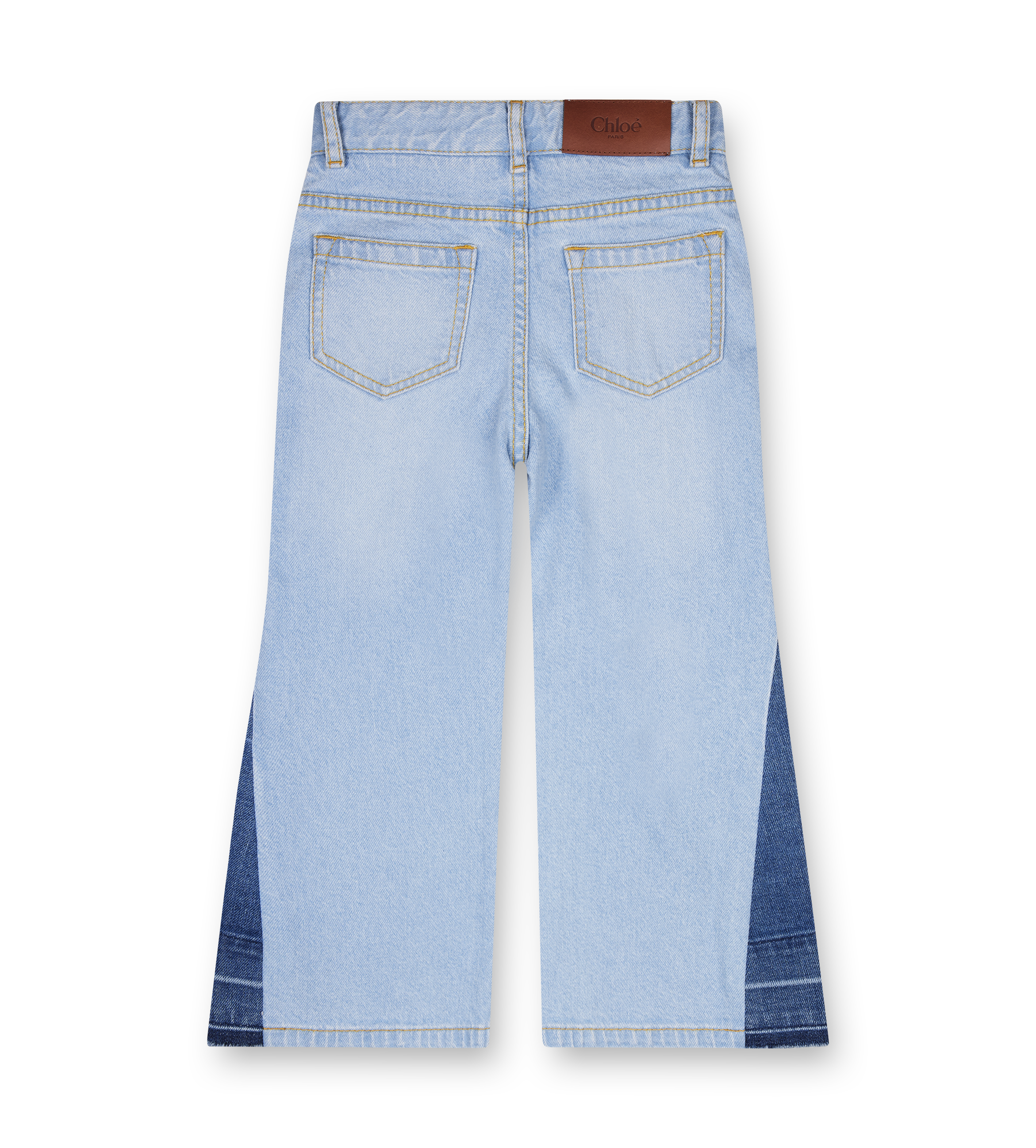 Light blue jeans with a brown belt on a white background