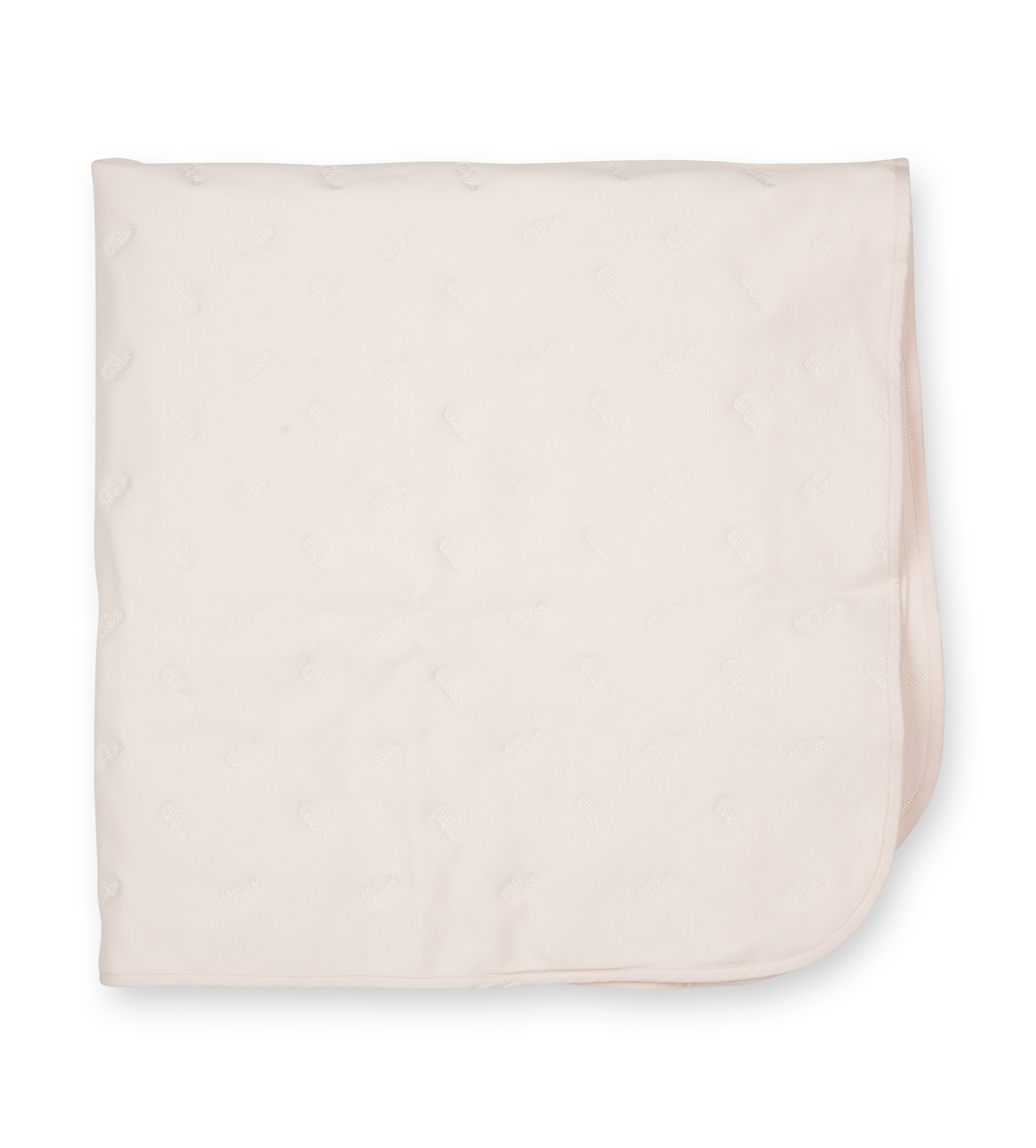 Beige quilt on a white background