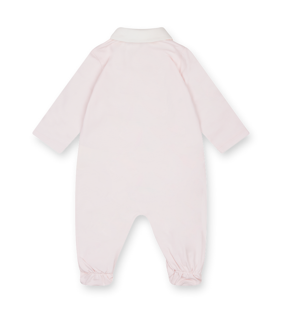 Light pink baby onesie on a white background