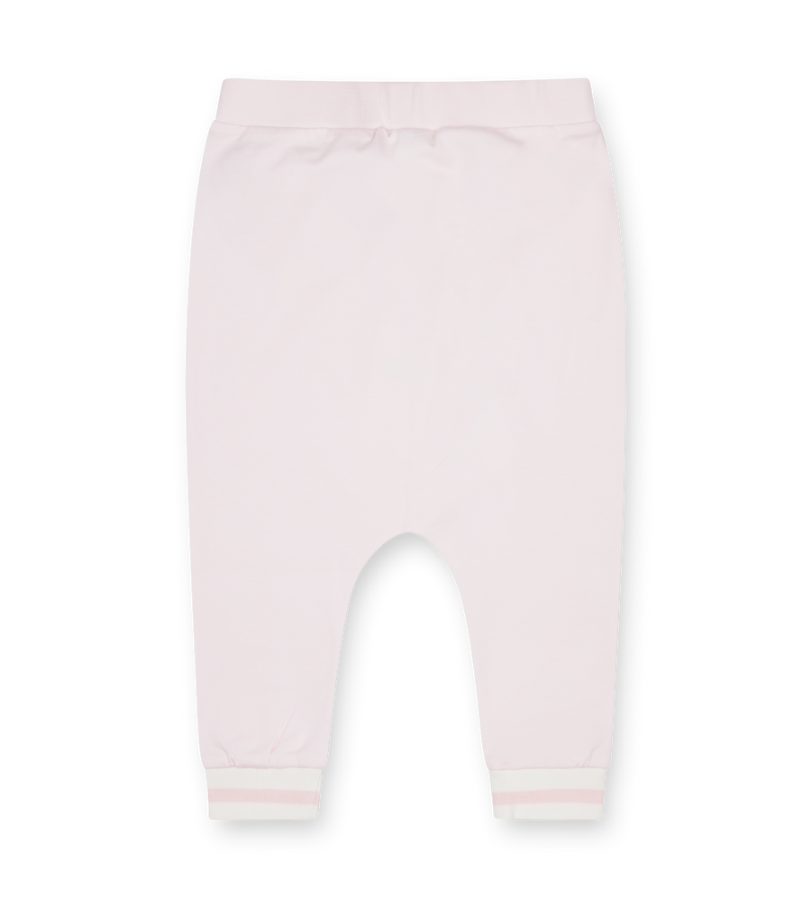 Light pink baby pants on a white background