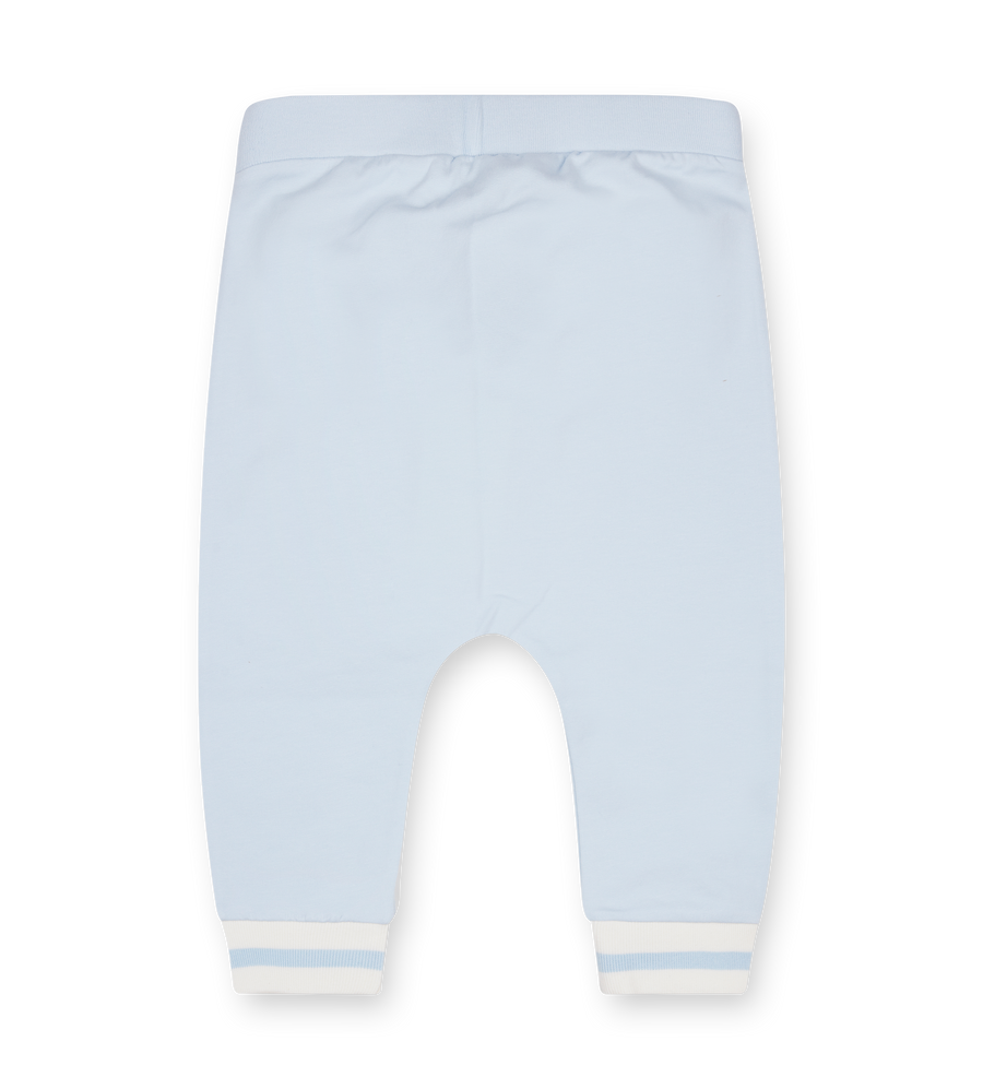 Light blue baby pants with white cuffs on a white background