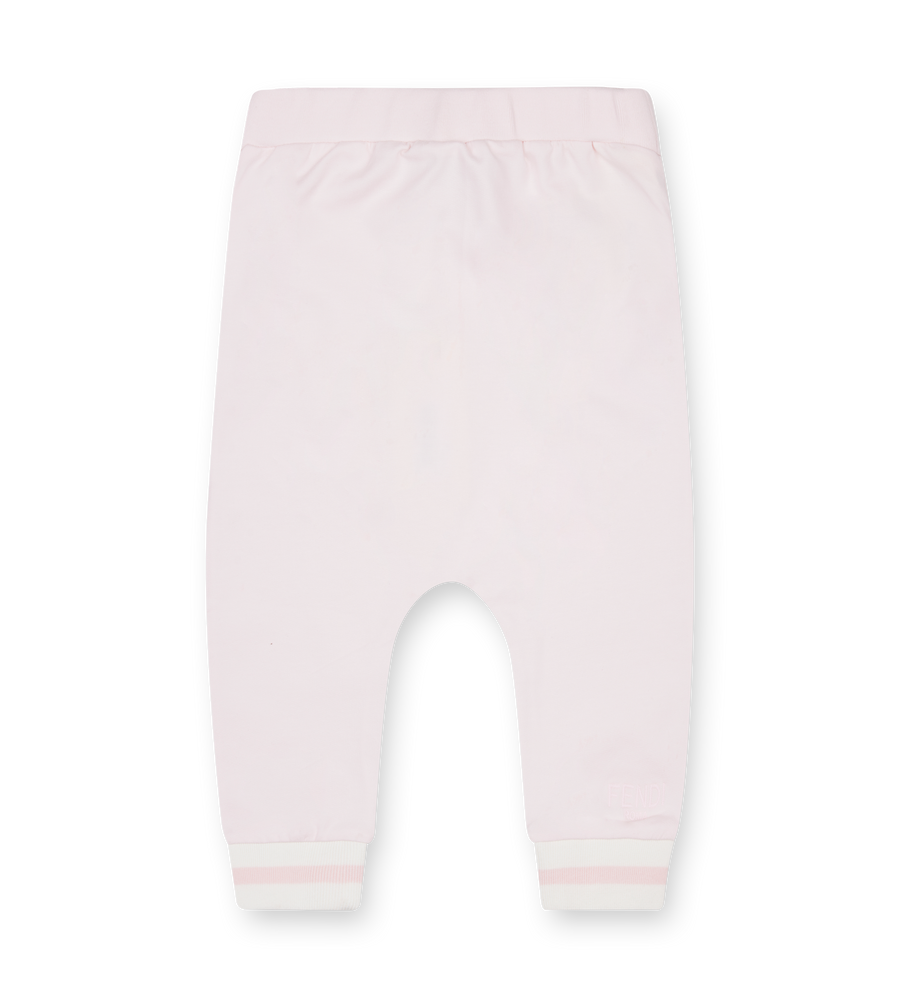 Light pink baby leggings on a white background