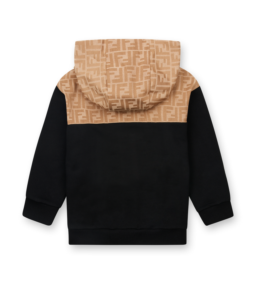 Black hoodie with beige hood featuring a pattern on a white background