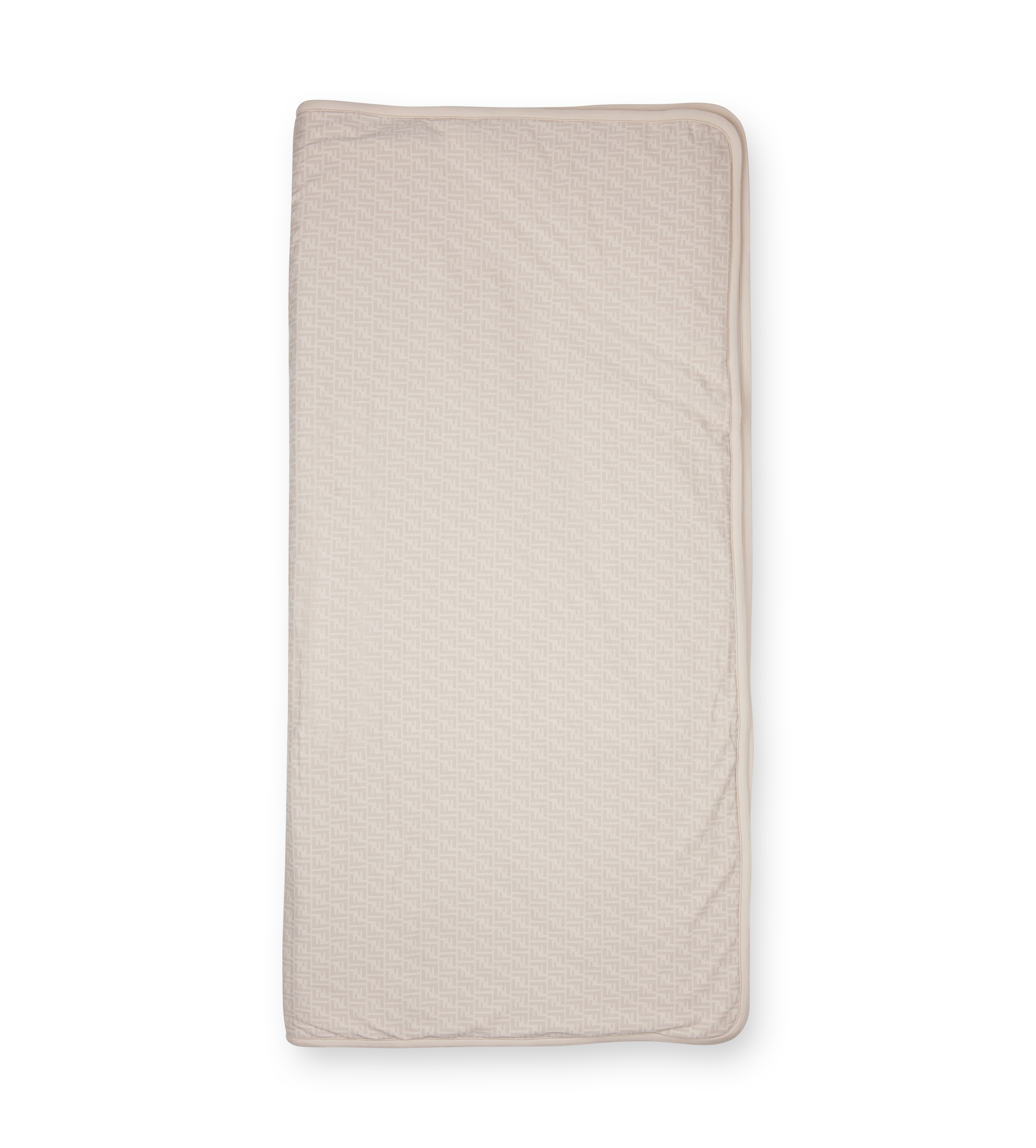 Quilted beige pad on a white background