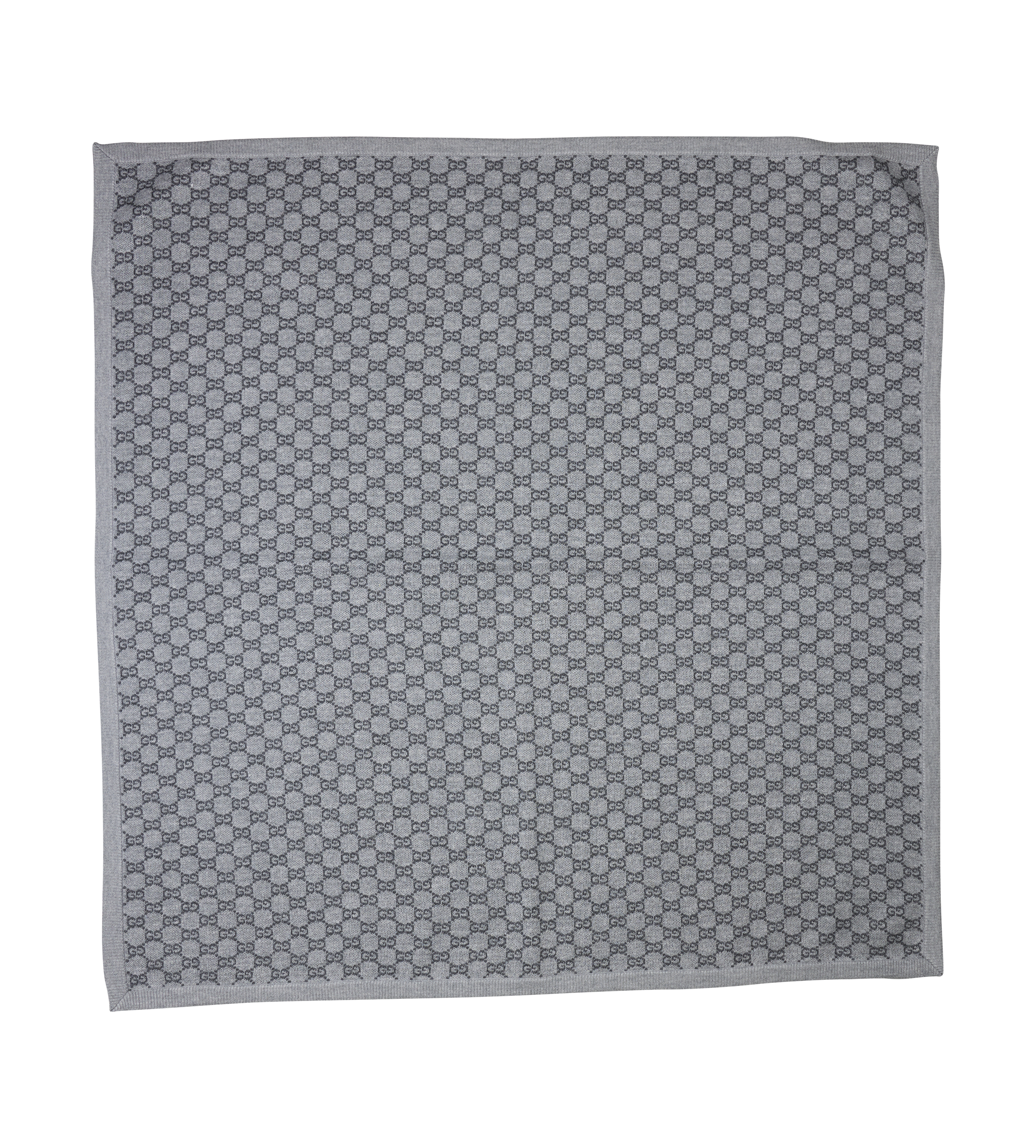Gray patterned fabric square on a white background