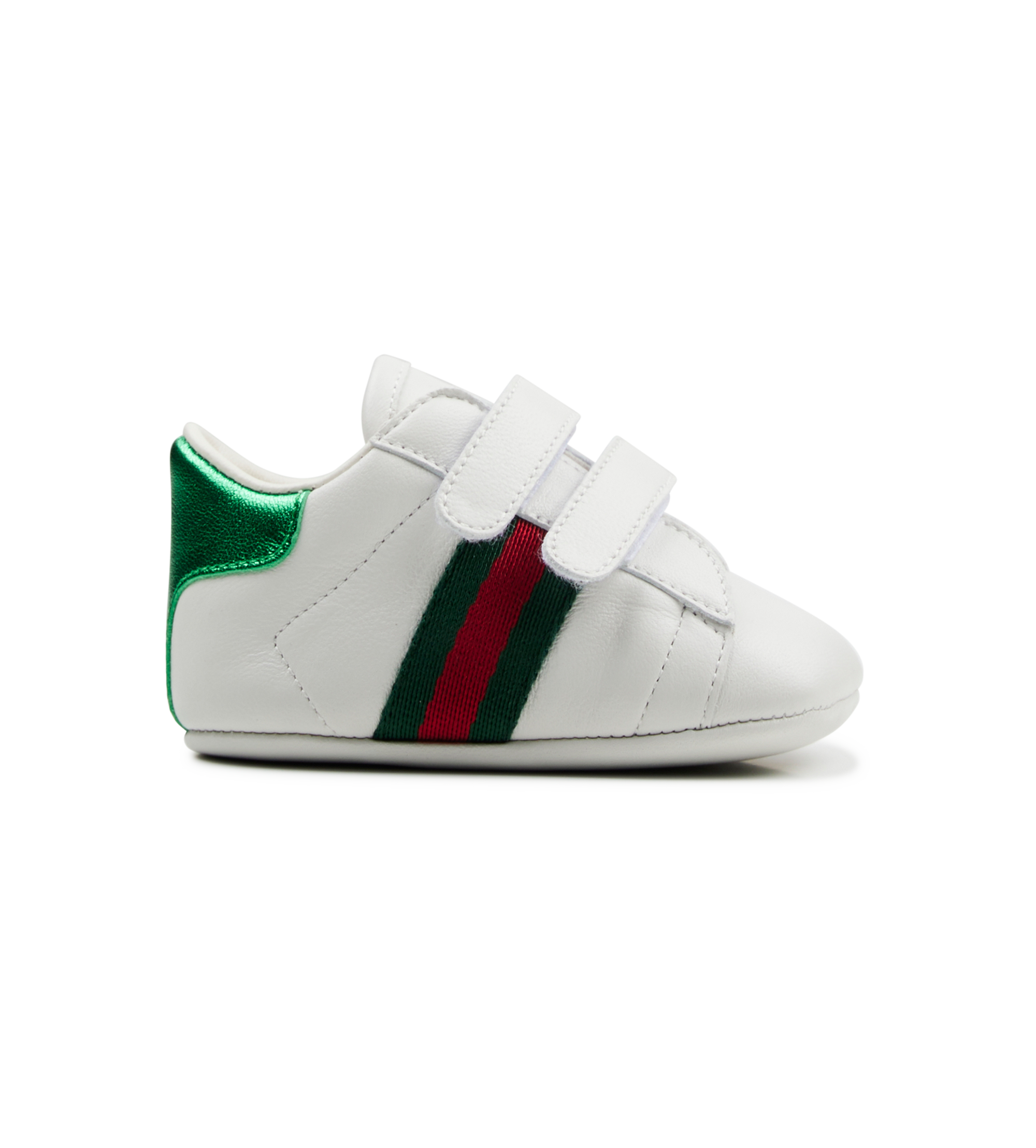 white baby shoe with green and red stripes
