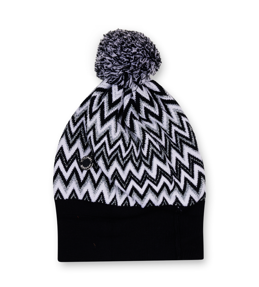 Black and white chevron patterned beanie with a pom-pom on a white background