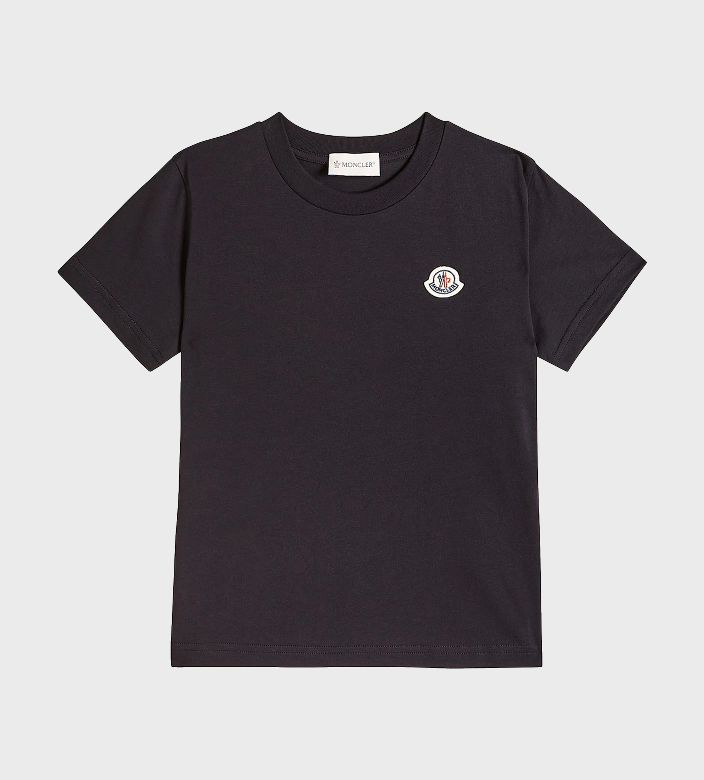 A black T-shirt with a logo-patch on the front and a crew neck.