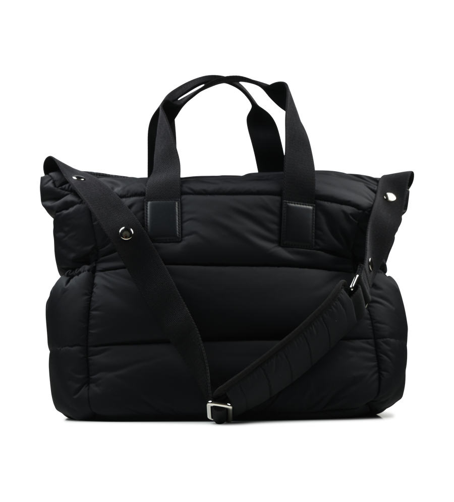Black travel bag with a shoulder strap on a white background