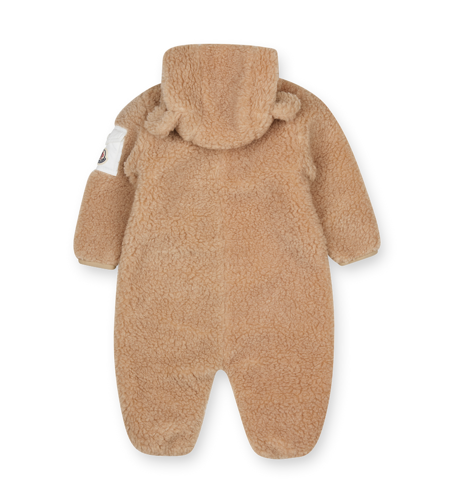 Brown baby snowsuit with a hood on a white background