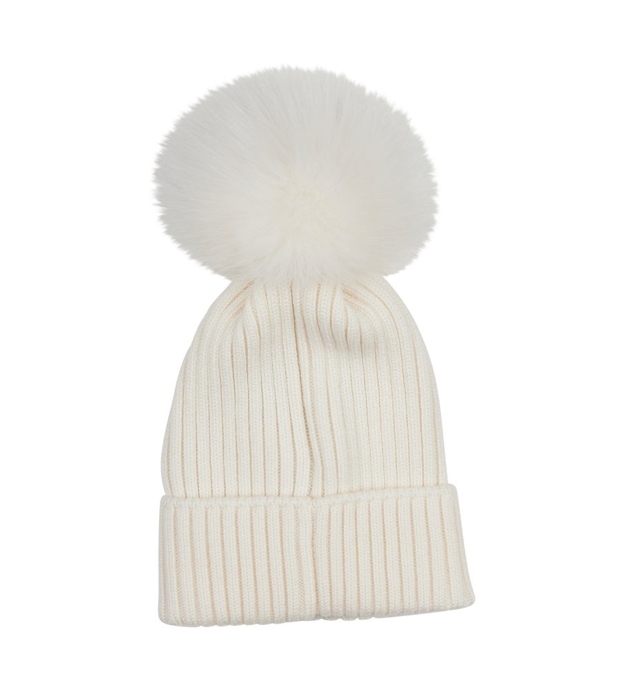 White knit beanie with a large white fur pom-pom on a white background