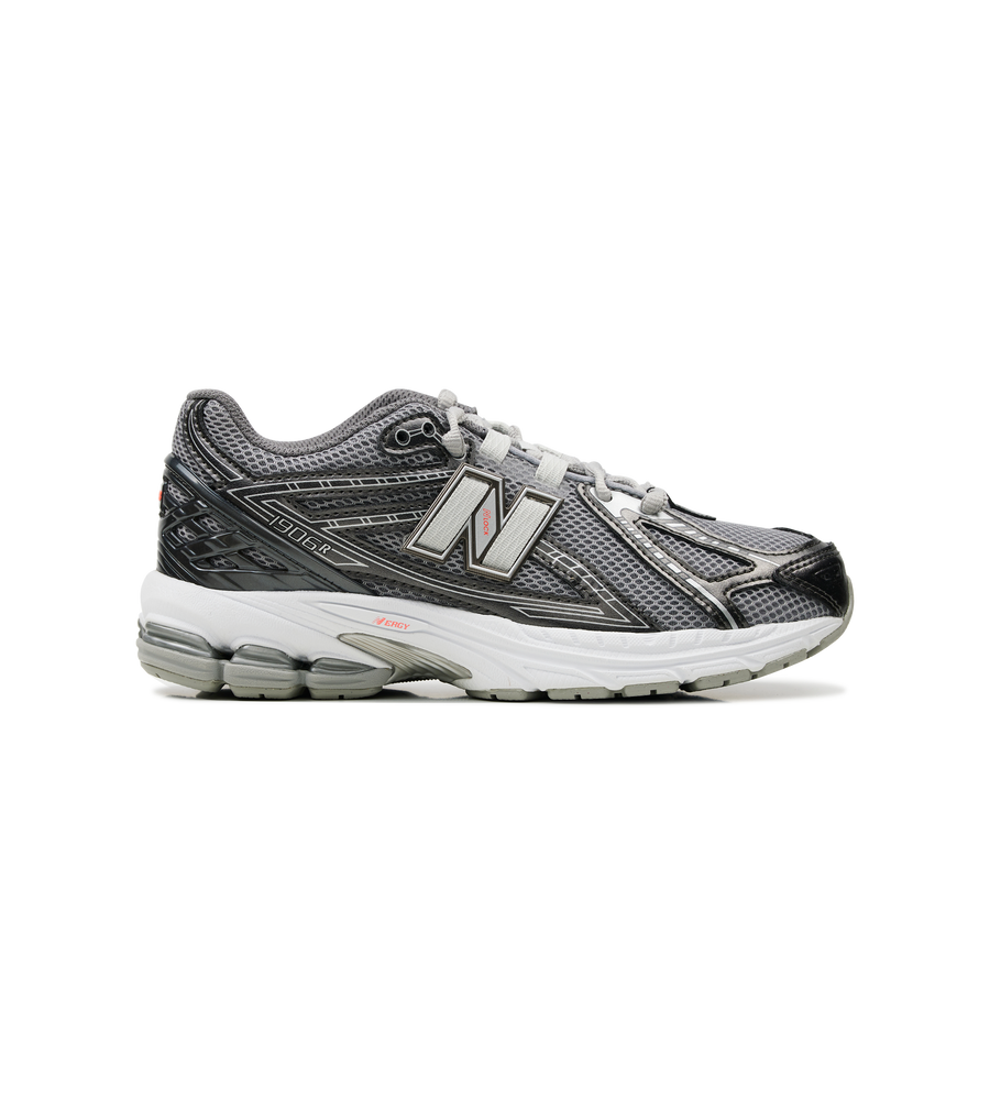 Gray and white running shoe on a white background