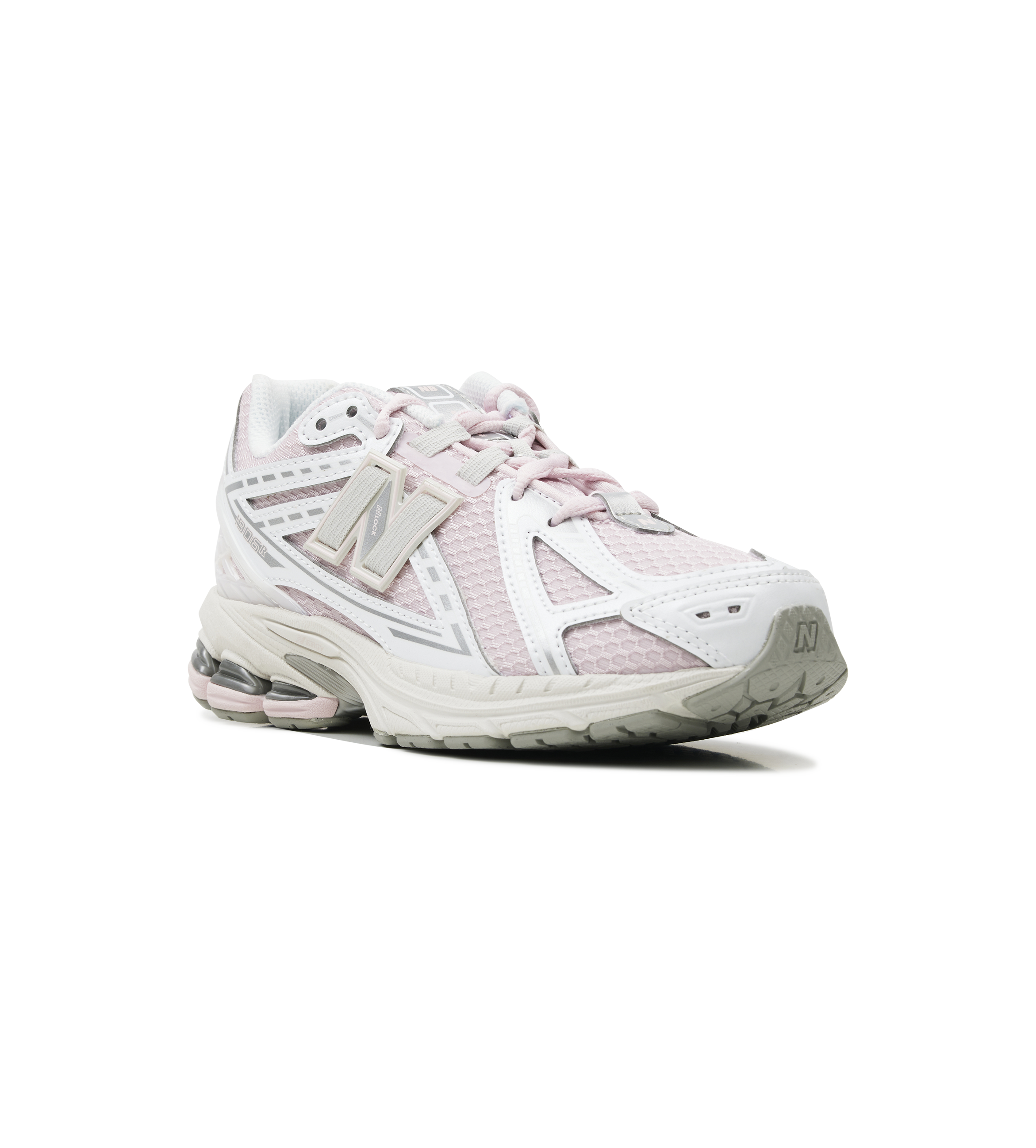White athletic shoe with pink accents on a white background