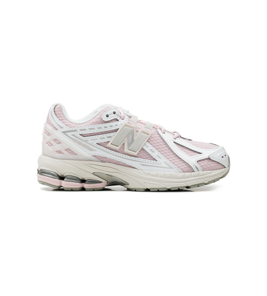 White and pink sneaker on a white background