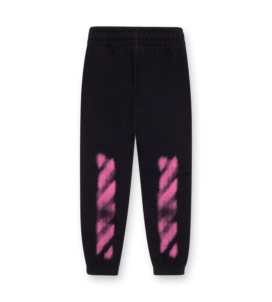 Off-White Arrow Spray Sweatpants in black with fuchsia spray print and arrow motif at back.

