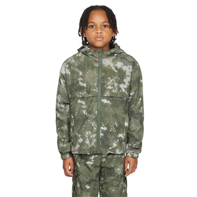 Person wearing a camouflage outfit on a white background