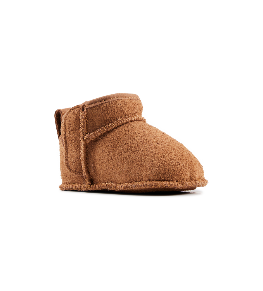 Brown baby bootie on a white background